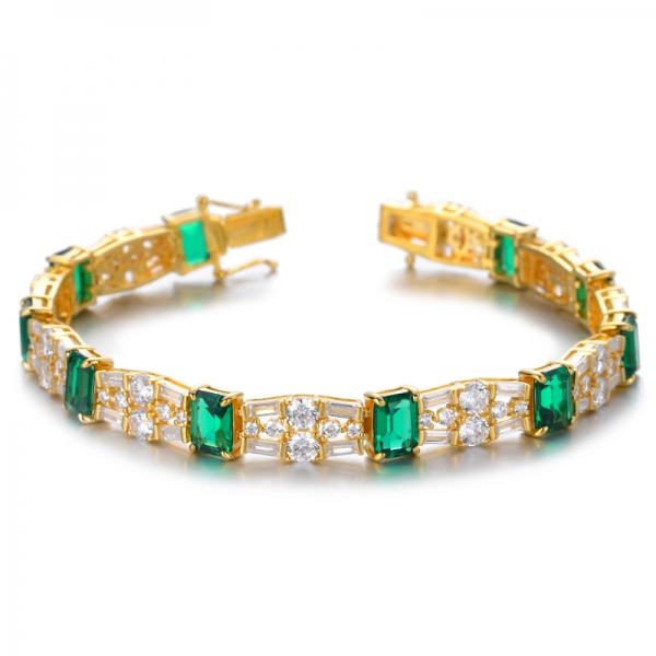 Bracelet 7 pouces en argent plaqué or jaune 18 carats avec émeraude simulée verte
 