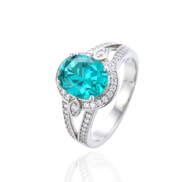 Bague Paraiba de forme ovale et ronde en argent rhodié et zircone cubique blanche 