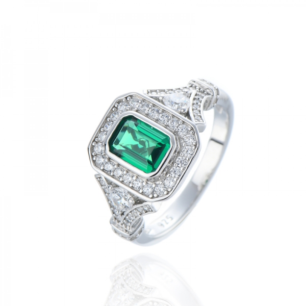 Bague en argent rhodié avec nano vert taille émeraude et zircon cubique blanc rond 