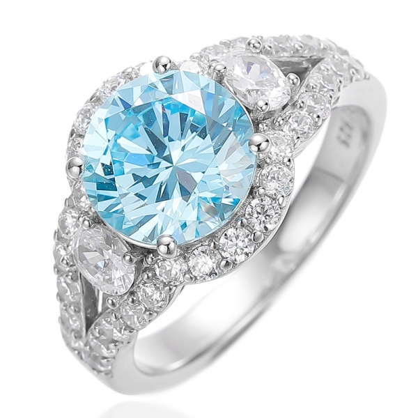 Bague ronde en argent rhodié avec zircon cubique bleu ciel et blanc 