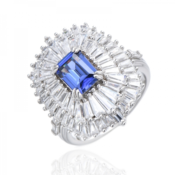 Bague en argent rhodié avec tanzanite taille émeraude et zircon cubique blanc 