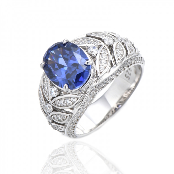 Bague en argent rhodié avec tanzanite de forme ovale et zircon cubique blanc rond 