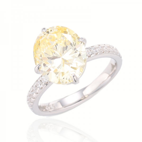 Bague en argent rhodié avec diamant de forme ovale jaune et rond blanc avec zircon cubique 