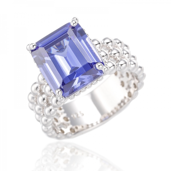 Bague en argent plaqué rhodium avec zircon cubique et tanzanite taille émeraude 925 