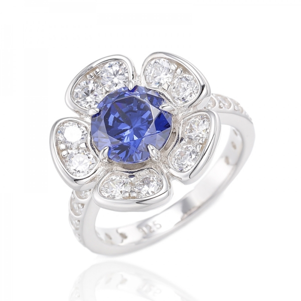 Bague en argent rhodié avec tanzanite et zircon cubique blanc de forme ronde 