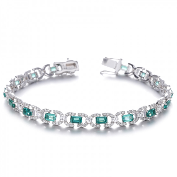 Bracelet en argent rhodié et zircon cubique de couleur G, taille émeraude et diamant rond
     