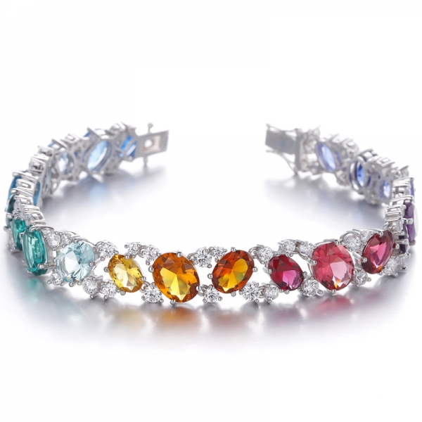 
     Couleur arc-en-ciel de forme ovale et bracelet rond en argent rhodié avec zircon cubique blanc
     