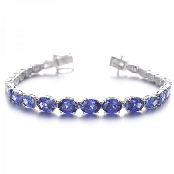 
     Bracelet en argent plaqué rhodium avec diamant de forme ovale G et zircon cubique
     